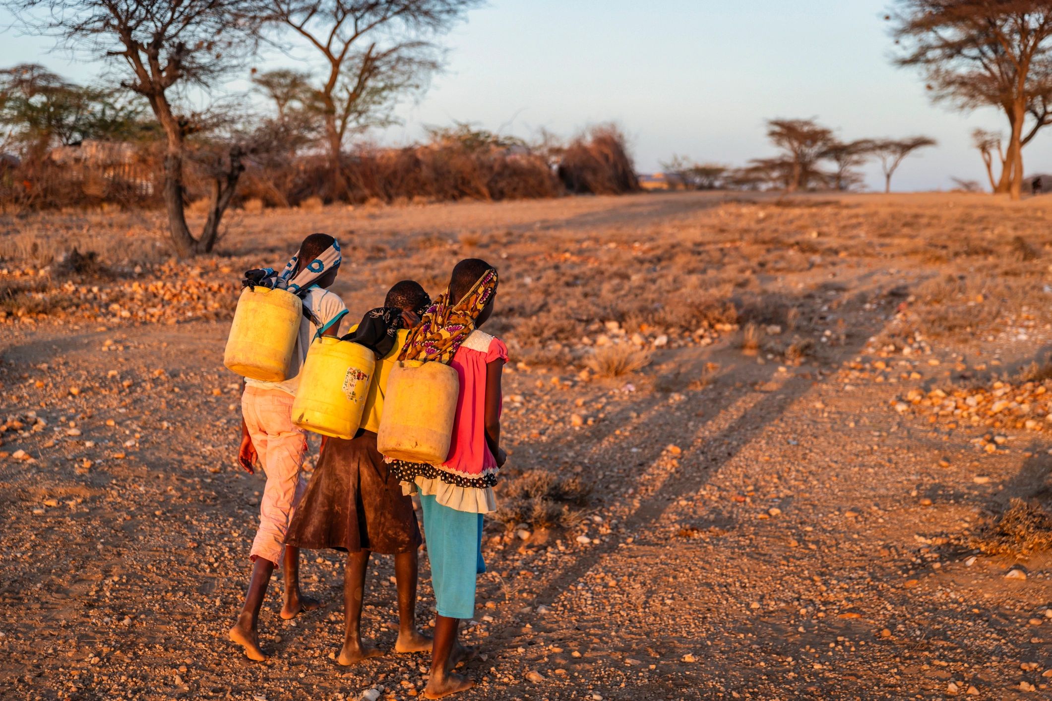 Children walking together in a rural community