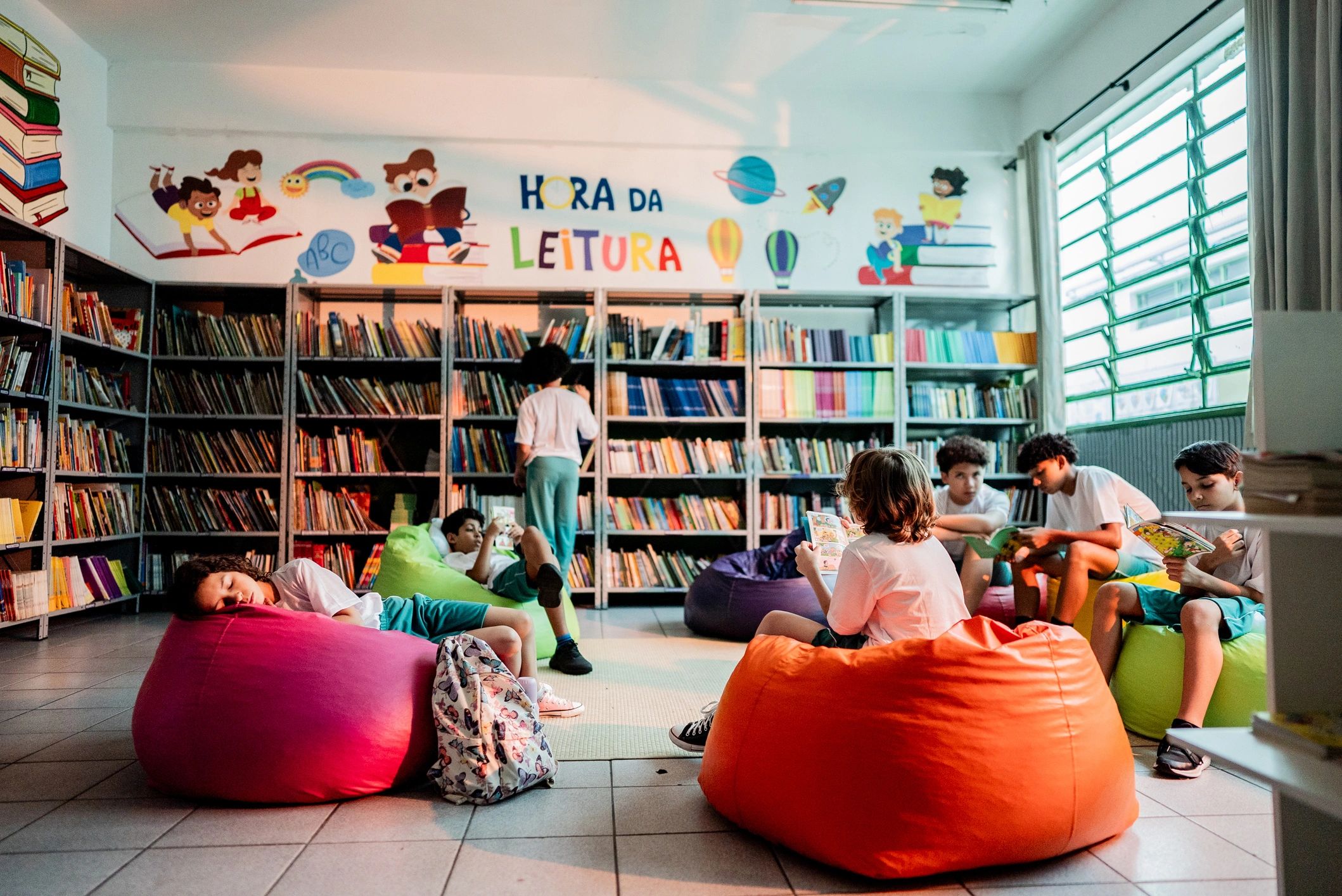 Children enjoying a literacy session together